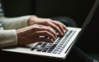 person using laptop